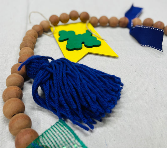 Mardi Gras bead and tassel banner / garland
